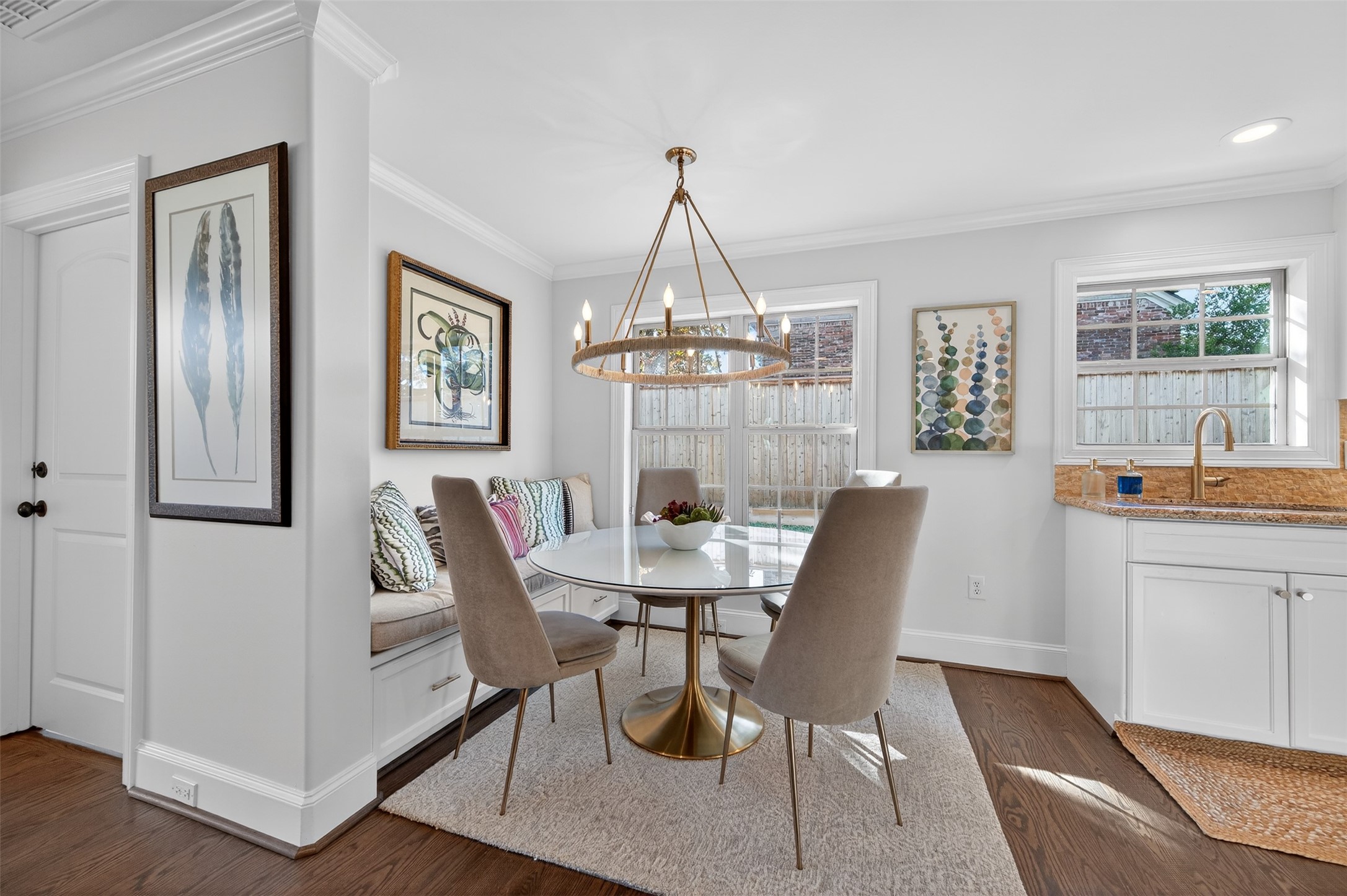 13315 Tosca Lane Houston, TX 77079 - Photo 15 of 42 a dining room with furniture a chandelier and wooden floor