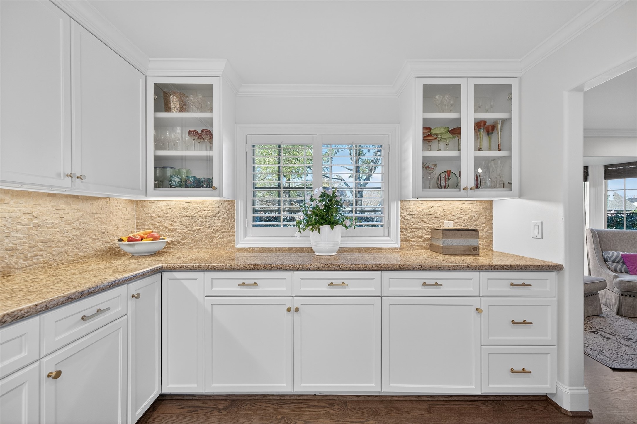 13315 Tosca Lane Houston, TX 77079 - Photo 19 of 42 a kitchen with granite countertop white cabinets and a window