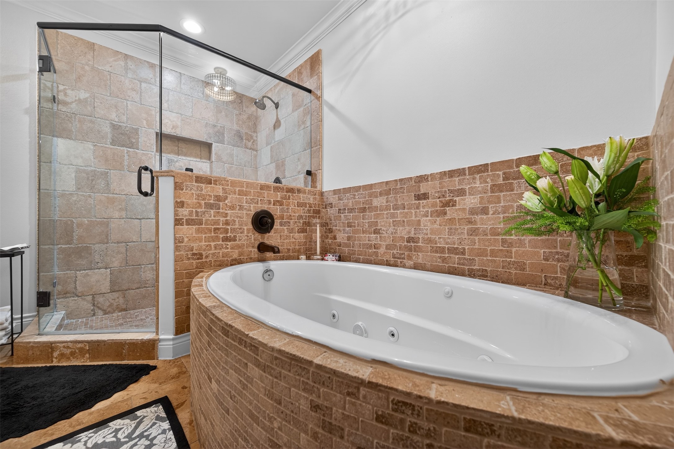 13315 Tosca Lane Houston, TX 77079 - Photo 24 of 42 a bathroom with a bathtub and a shower