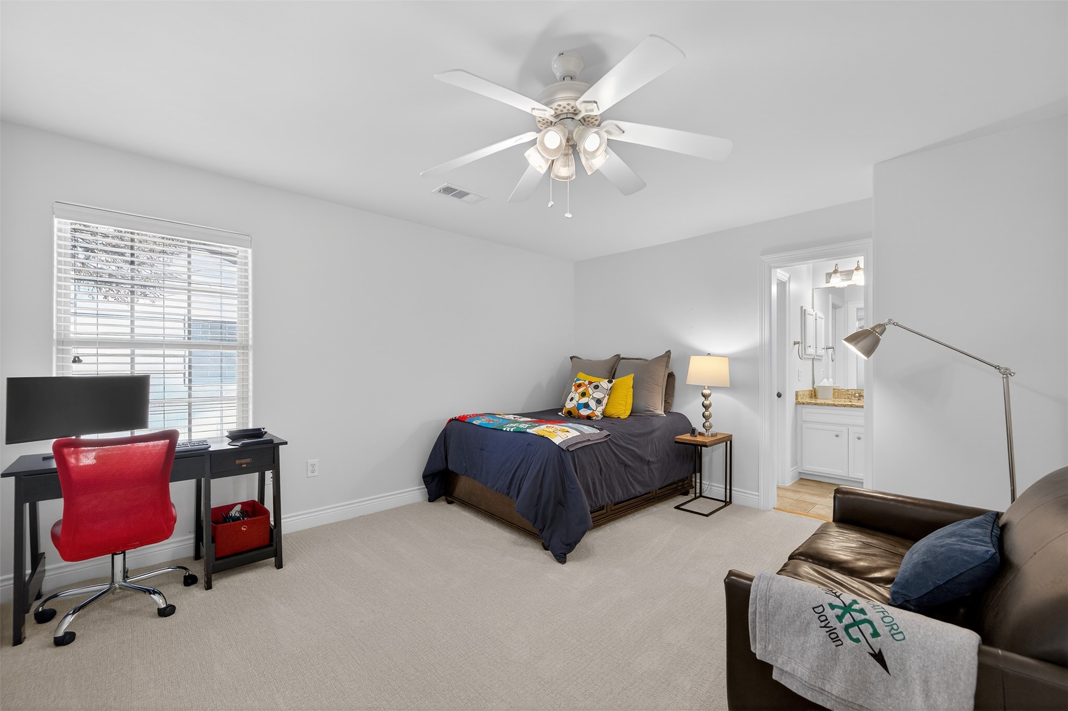 13315 Tosca Lane Houston, TX 77079 - Photo 28 of 42 a bedroom with furniture and a window