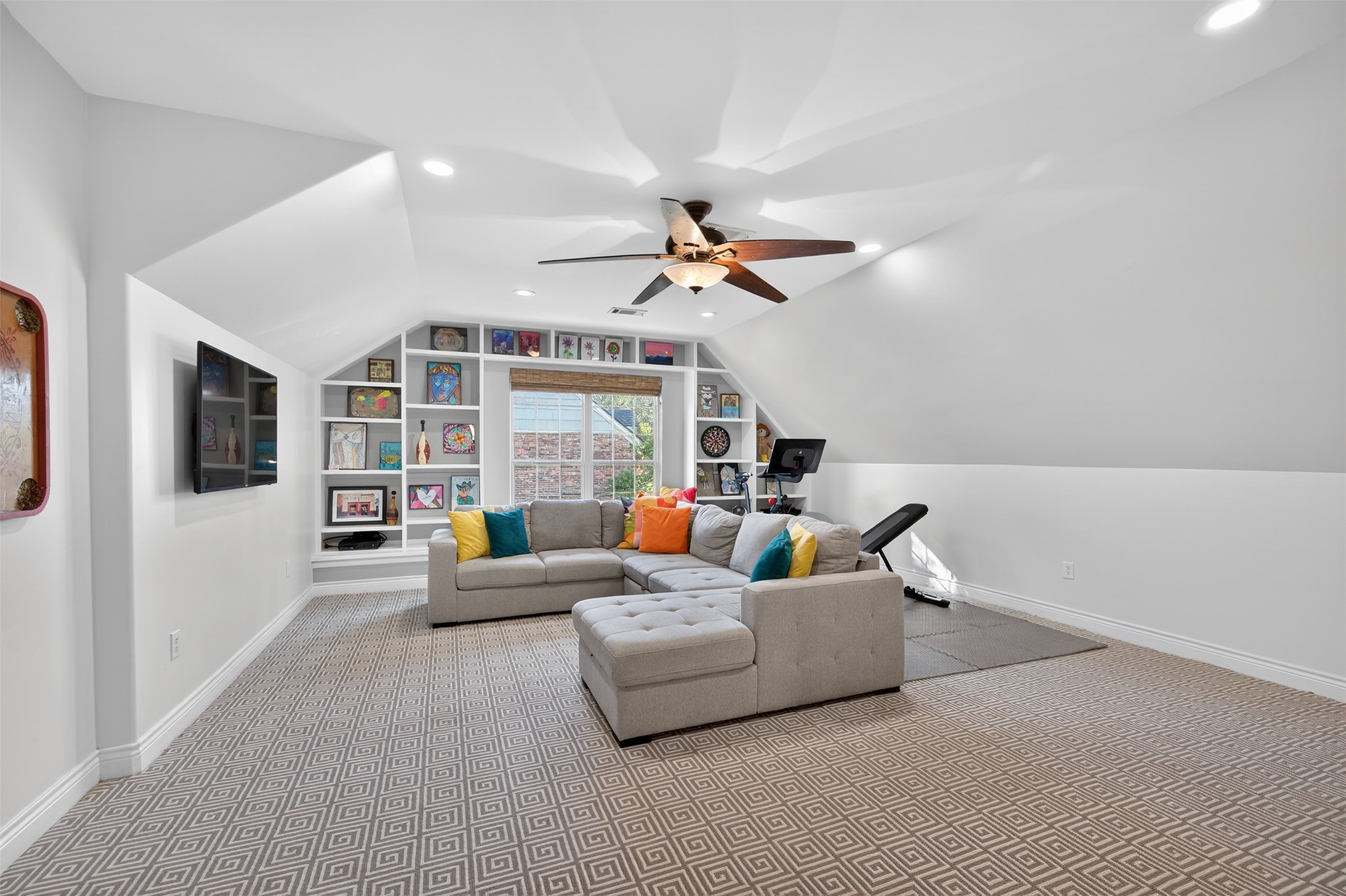 13315 Tosca Lane Houston, TX 77079 - Photo 33 of 42 a living room with furniture and a ceiling fan