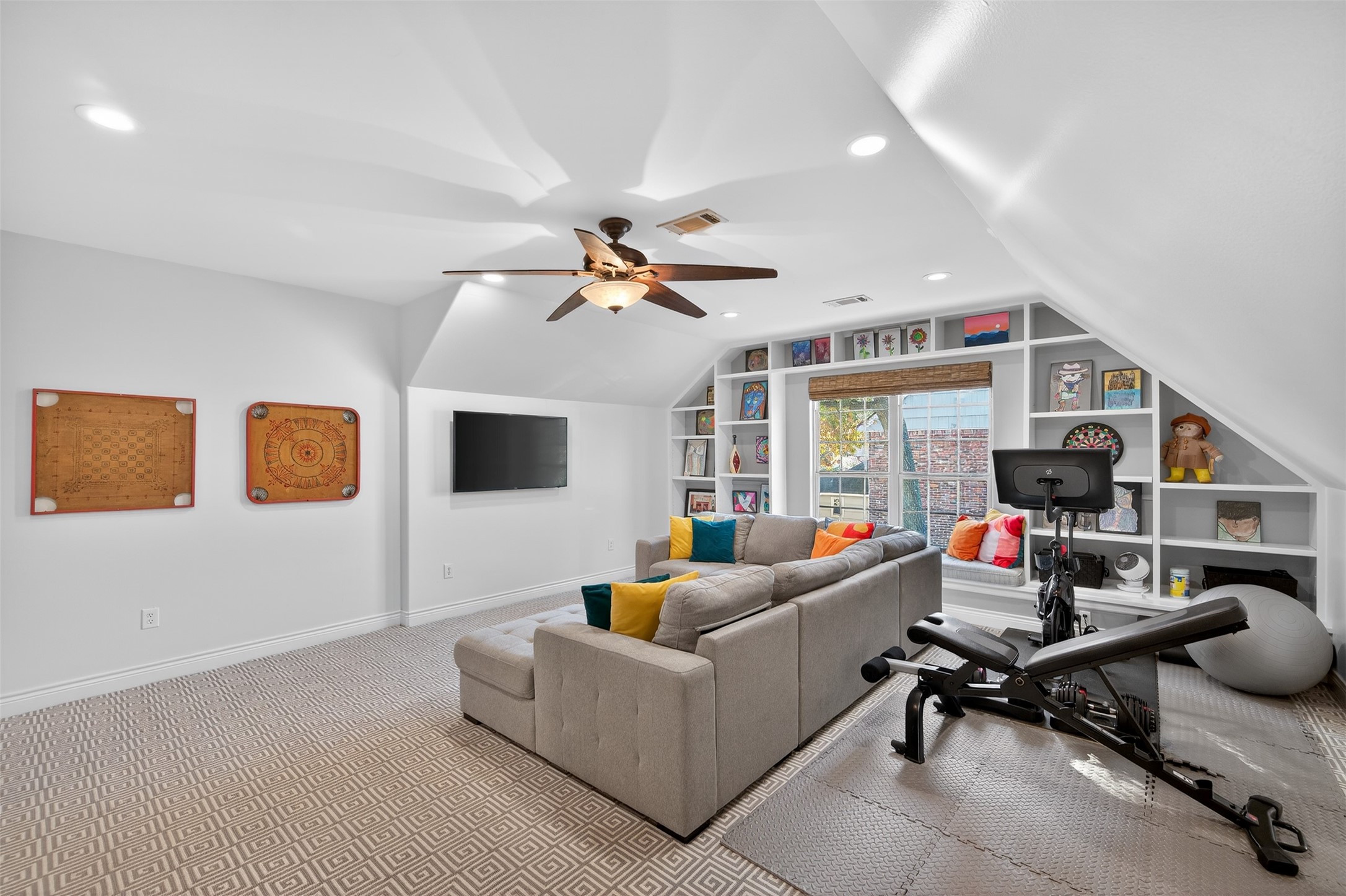 13315 Tosca Lane Houston, TX 77079 - Photo 34 of 42 a living room with furniture and a flat screen tv