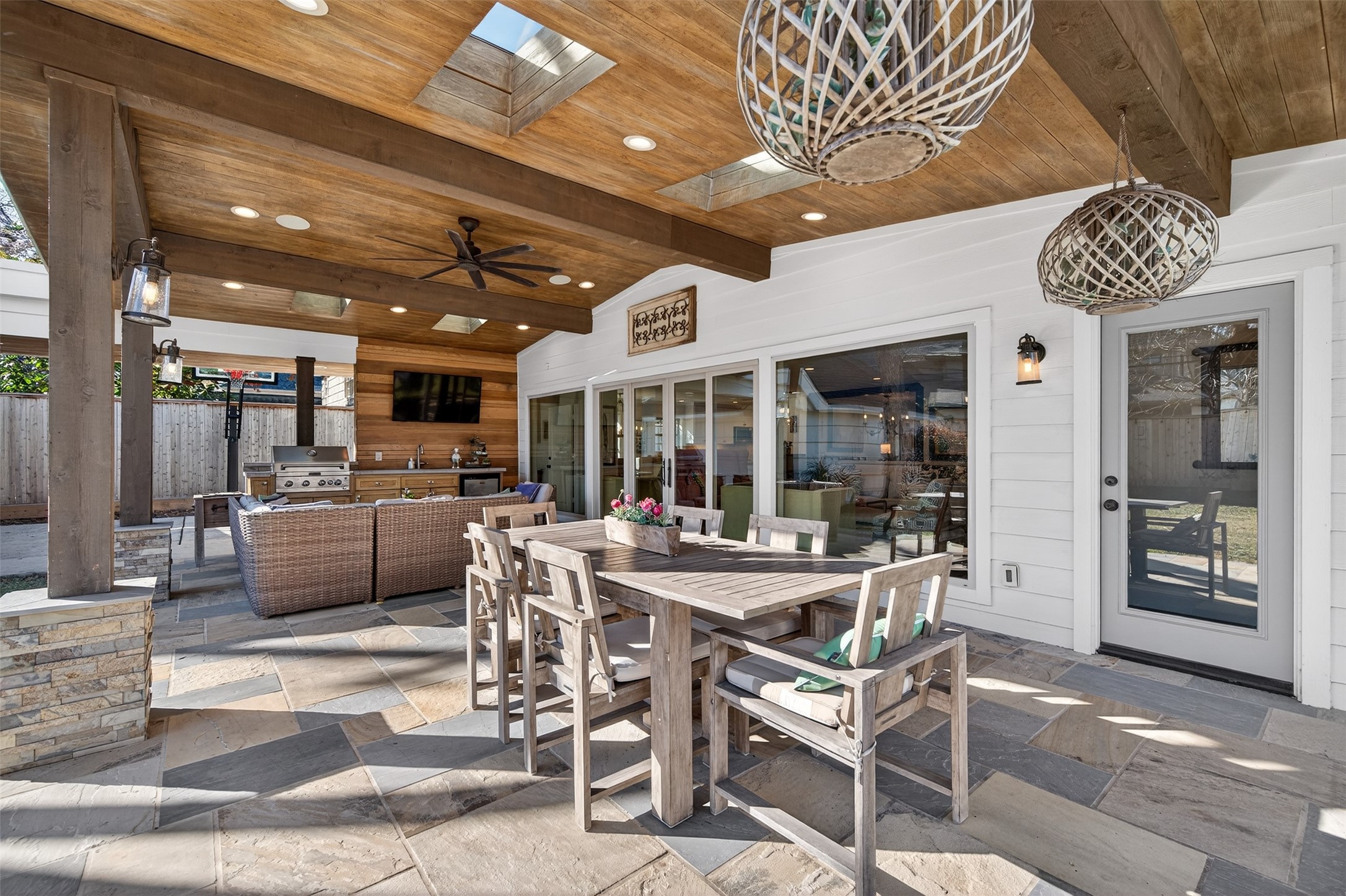 13315 Tosca Lane Houston, TX 77079 - Photo 35 of 42 a dining room with furniture and a large window