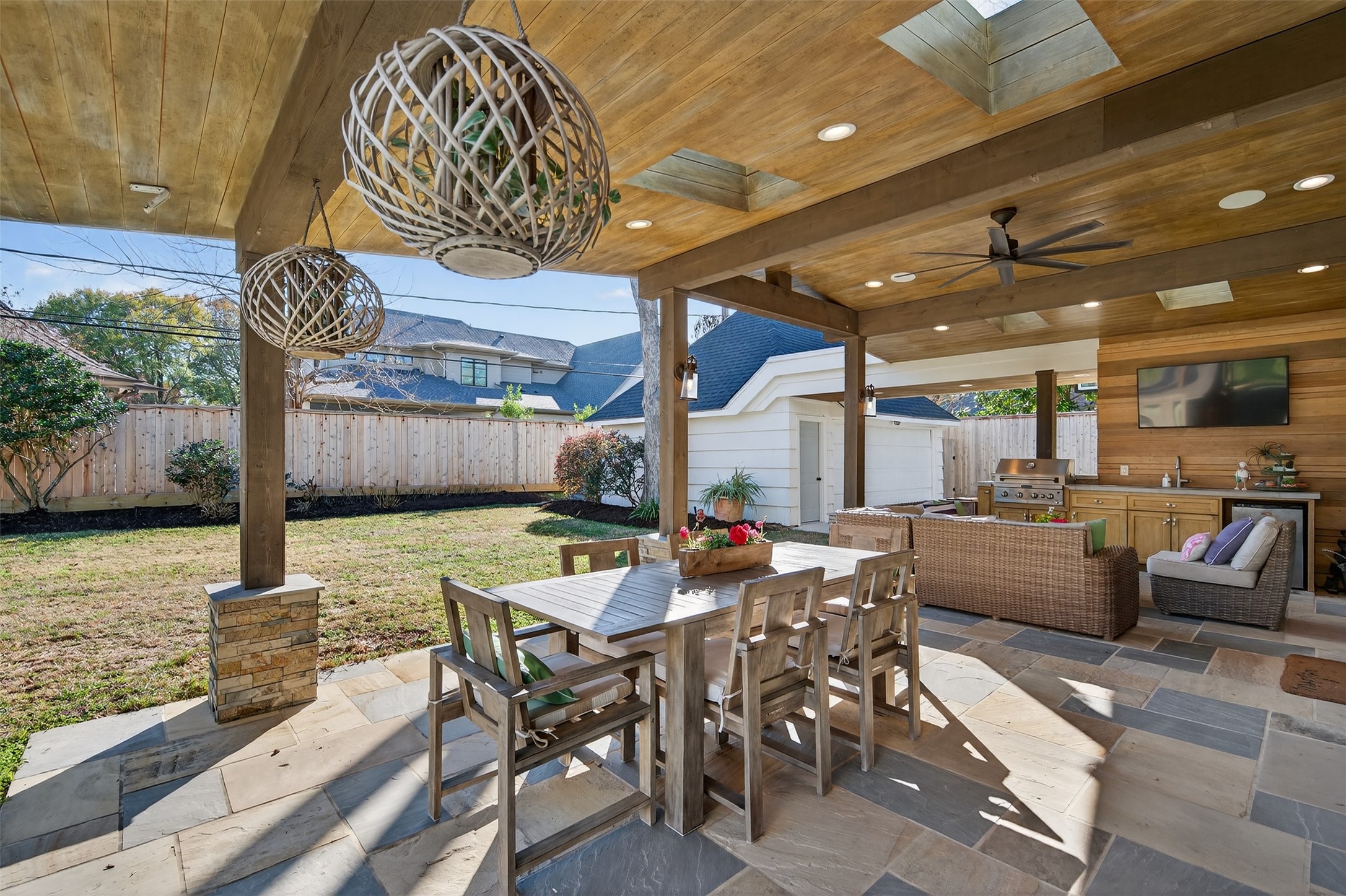 13315 Tosca Lane Houston, TX 77079 - Photo 36 of 42 a outdoor space with lots of tables a garden view and chairs