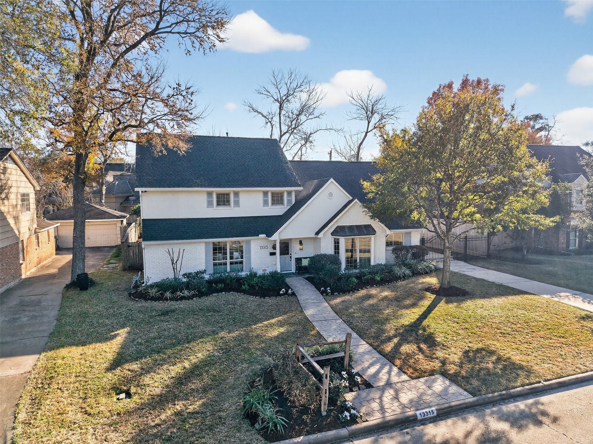 13315 Tosca Lane Houston, TX 77079 - Photo 42 of 42 a view of a house with swimming pool