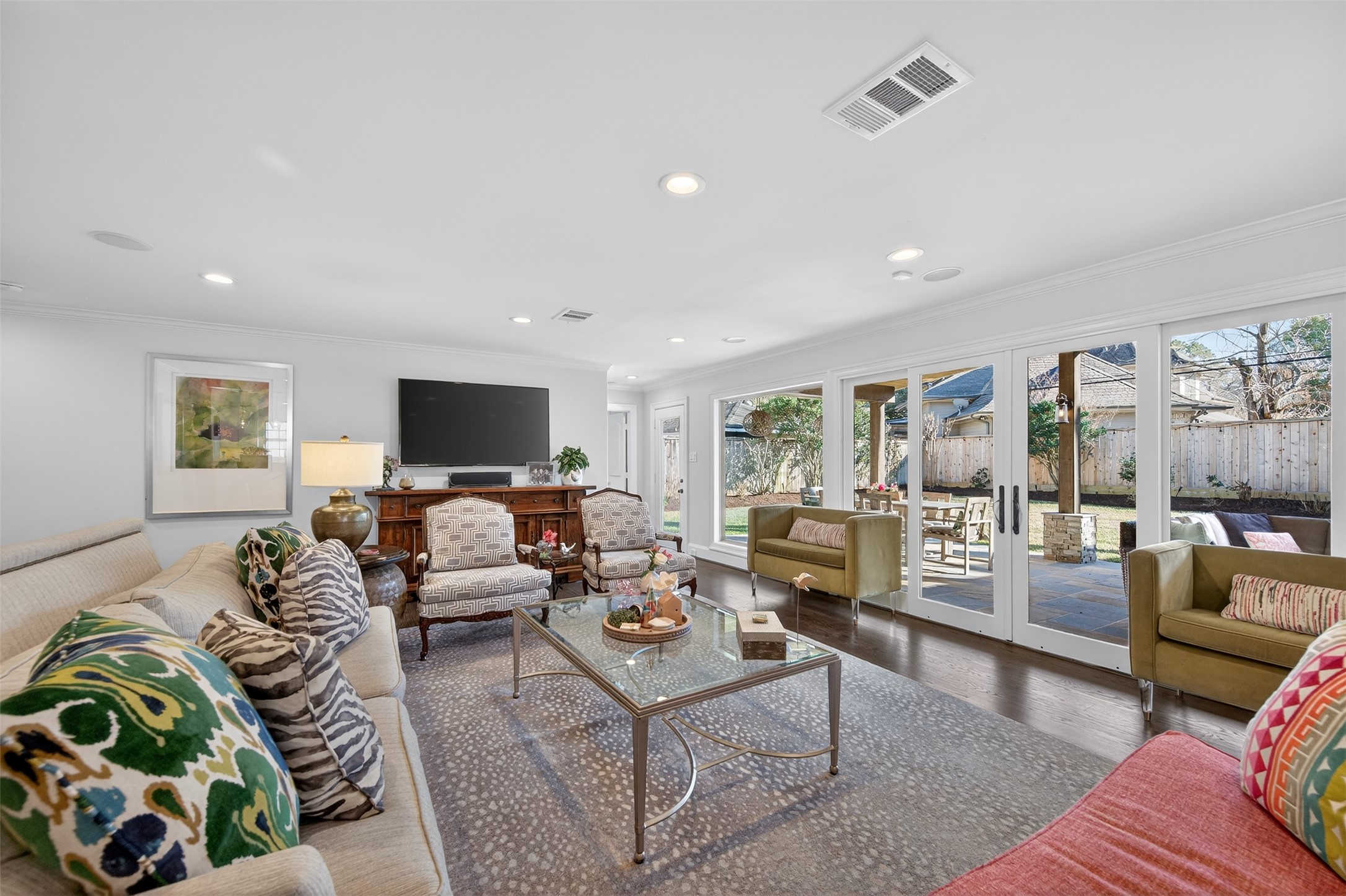 13315 Tosca Lane Houston, TX 77079 - Photo 10 of 42 a living room with furniture and a flat screen tv