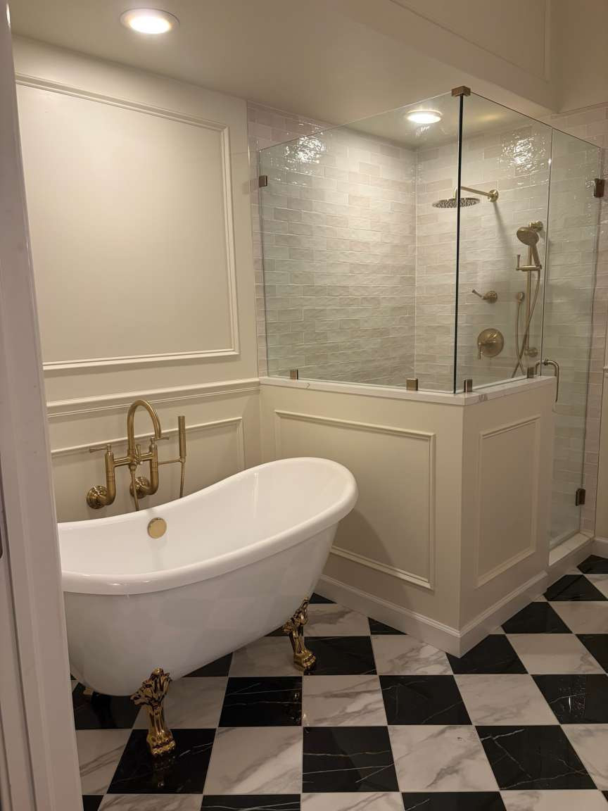 115 South Forest Ridge Boulevard Broken Arrow, OK 74014 - Photo 39 of 50 Clawfoot tub with brass fixtures, glass-enclosed shower, black and white checkered floor, wainscoting, and recessed lighting