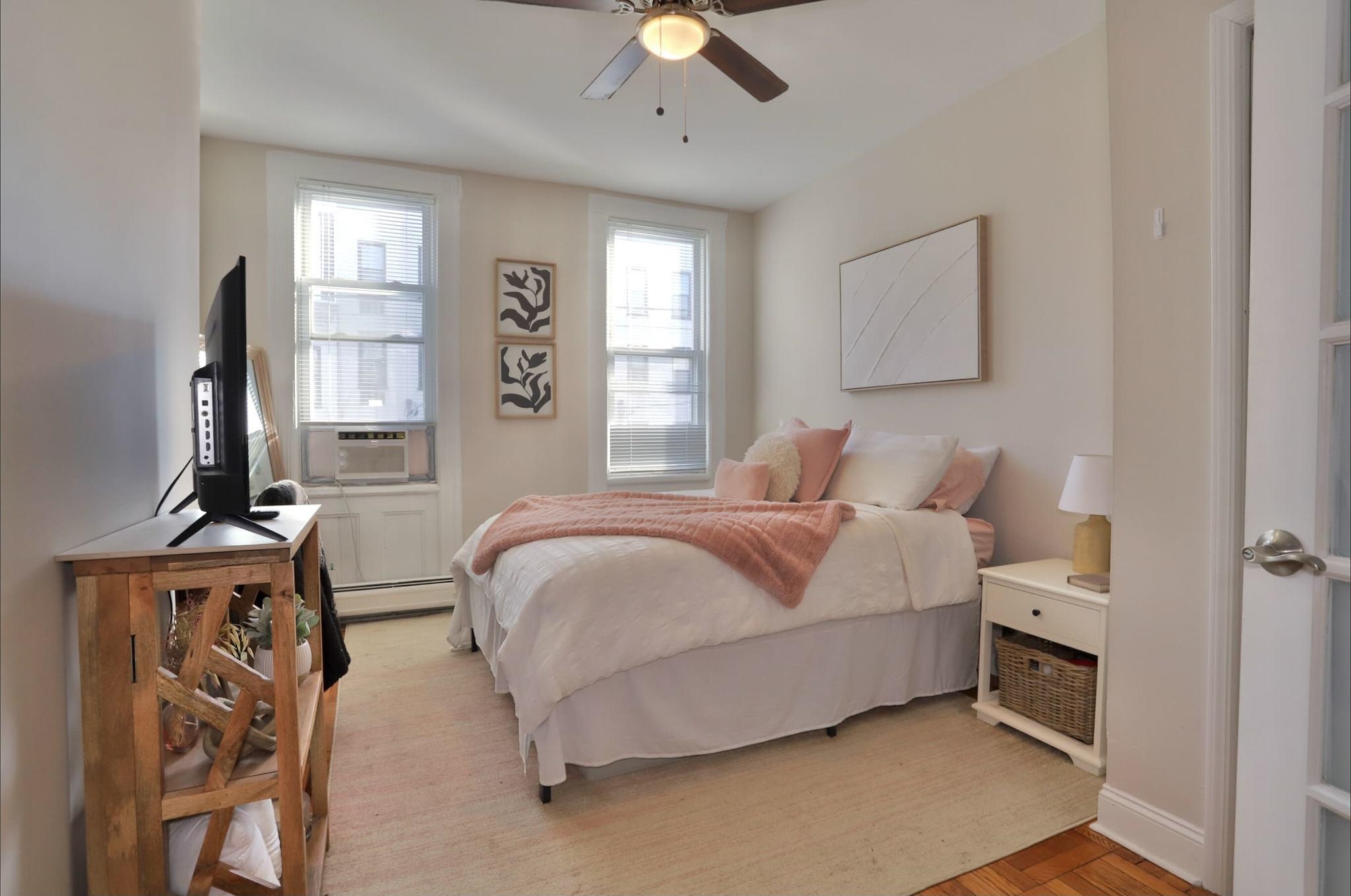 402 Monroe Street, Unit 2 Hoboken, NJ 07030 - Photo 14 of 22 a bedroom with bed and window