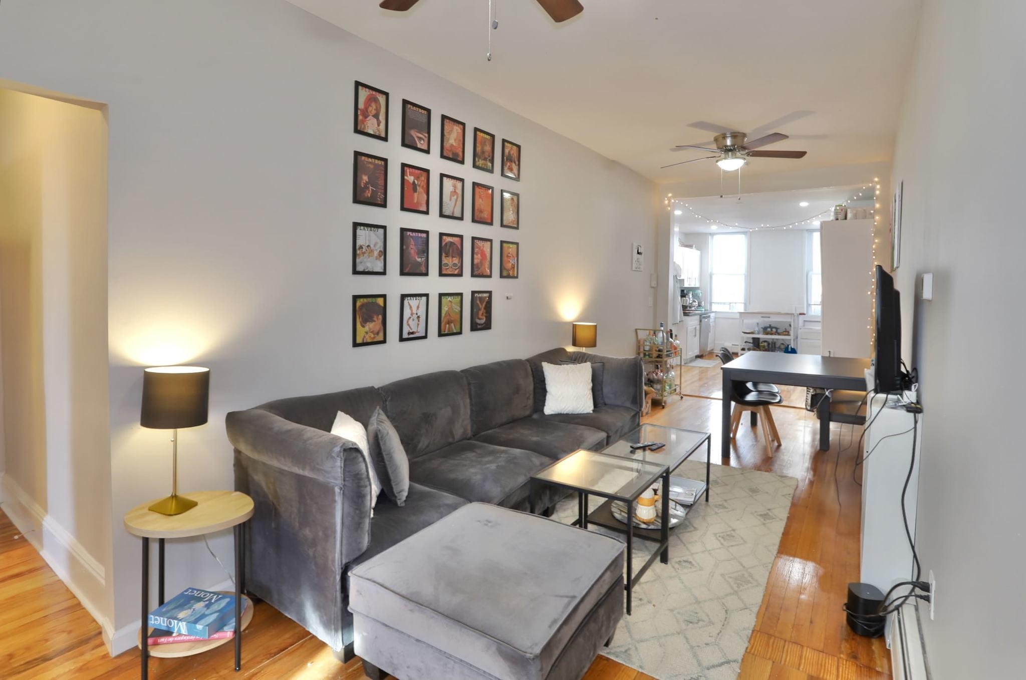 402 Monroe Street, Unit 2 Hoboken, NJ 07030 - Photo 8 of 22 a living room with furniture and a table