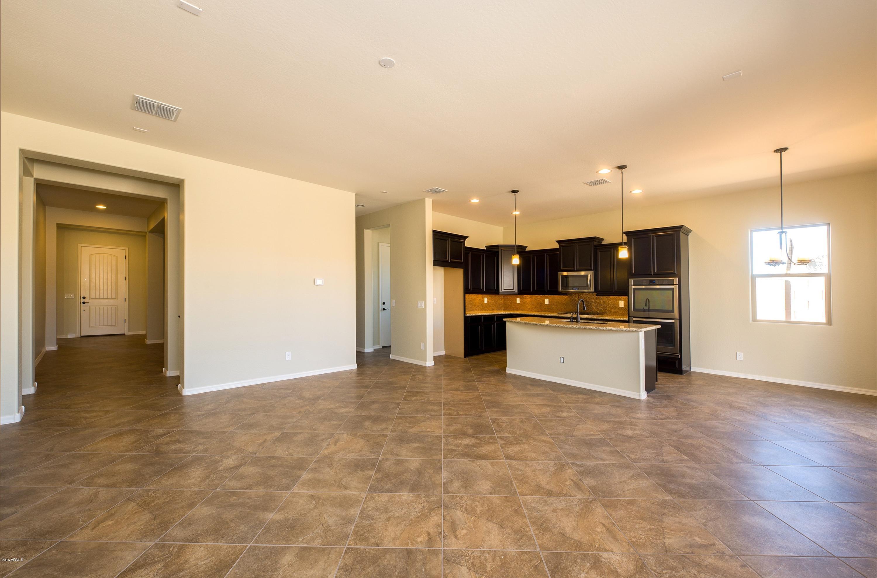 20528 West Alsap Road Buckeye, AZ 85396 - Photo 7 of 15 007_Open Kitchen - Great Room