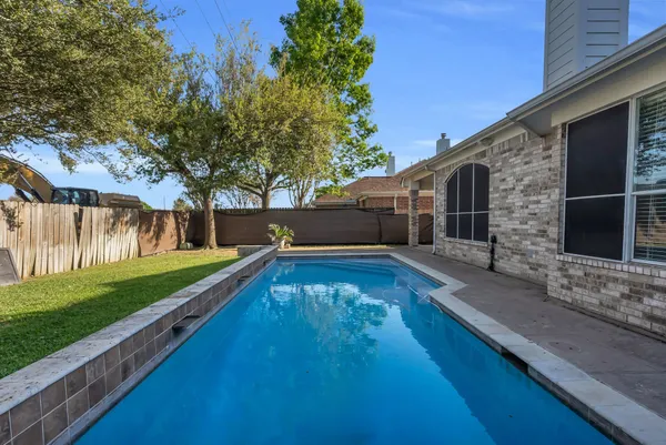 a view of a house with a swimming pool