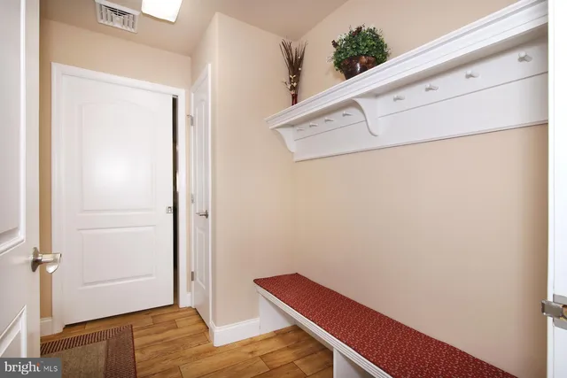 a work room with furniture and a window