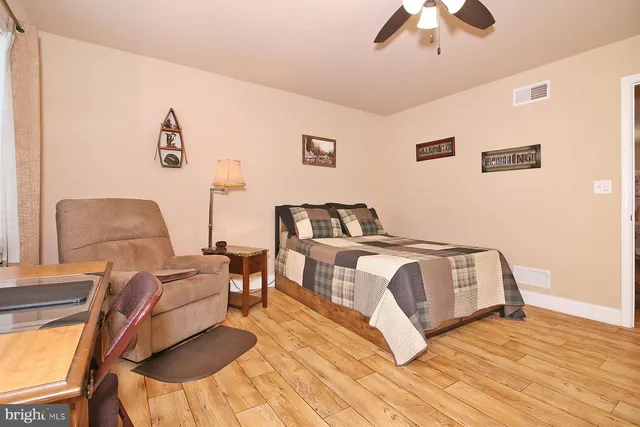 a view of a livingroom with a kitchen