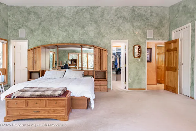a spacious bathroom with a sink a toilet and shower
