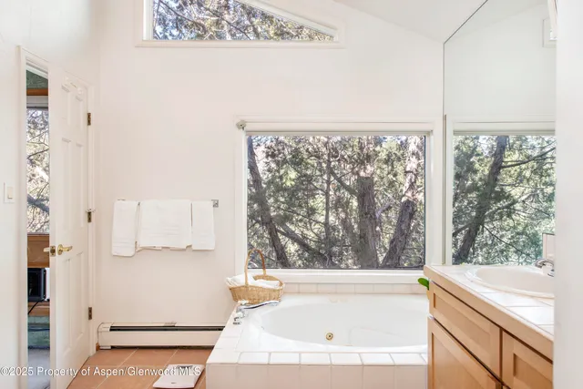 a kitchen with stainless steel appliances granite countertop a stove and a refrigerator