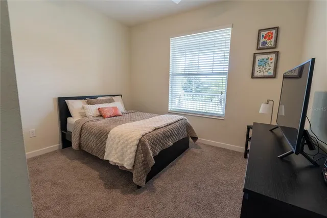a utility room with sink dryer and washer