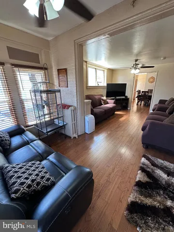 a view of a dining room with furniture and window