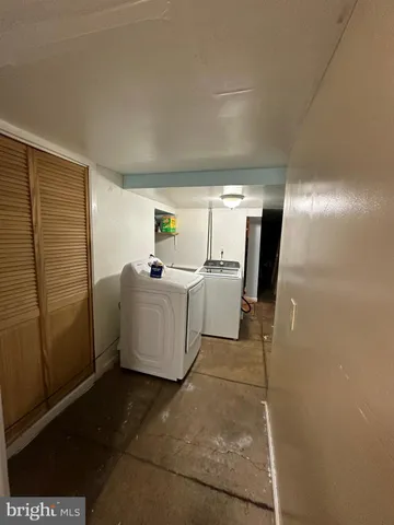 a room with furniture and gym equipment