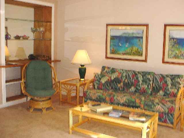 2777 South Kihei Road, Unit D104 Kihei, HI 96753 - Photo 3 of 8 a room with furniture and a mirror