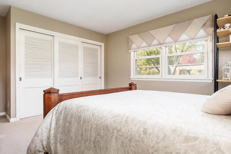 2303 Rock Terrace Rockford, IL 61103 - Photo 55 of 70 a bedroom with a large bed and a large window