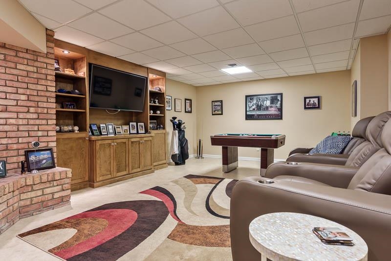 2303 Rock Terrace Rockford, IL 61103 - Photo 60 of 70 a living room with furniture and a flat screen tv