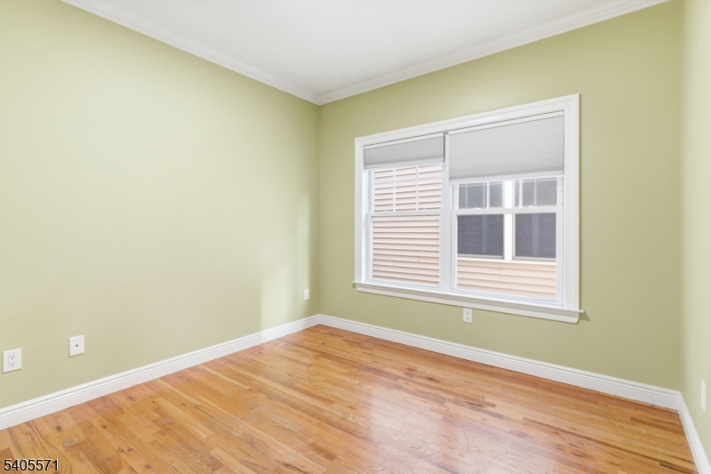 21 Freeman Street, Unit A2 Newark, NJ 07105 - Photo 11 of 24 a view of an empty room with a window