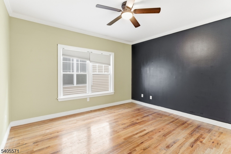 21 Freeman Street, Unit A2 Newark, NJ 07105 - Photo 19 of 24 a view of an empty room with a window