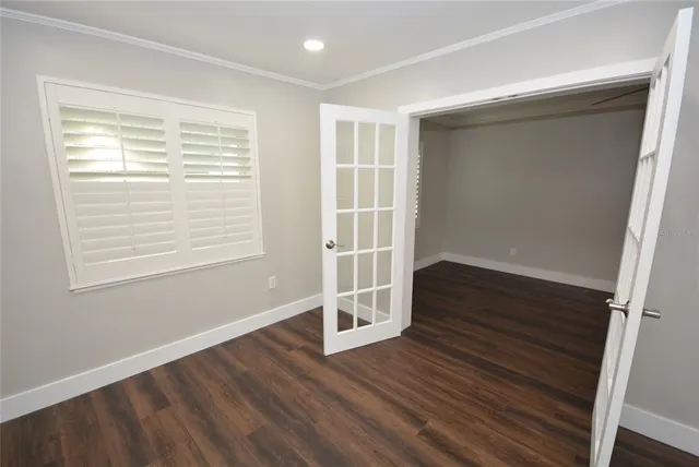a kitchen with stainless steel appliances a refrigerator sink and cabinets