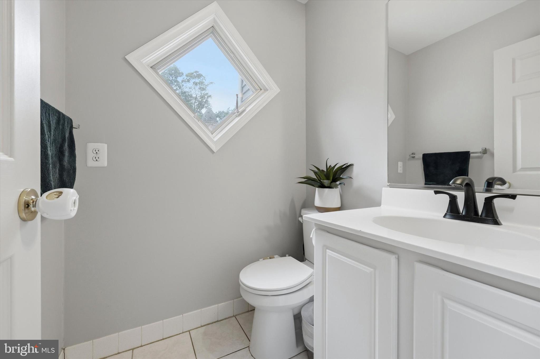 320 Maple Avenue Wyncote, PA 19095 - Photo 11 of 28 a bathroom with a toilet sink and mirror