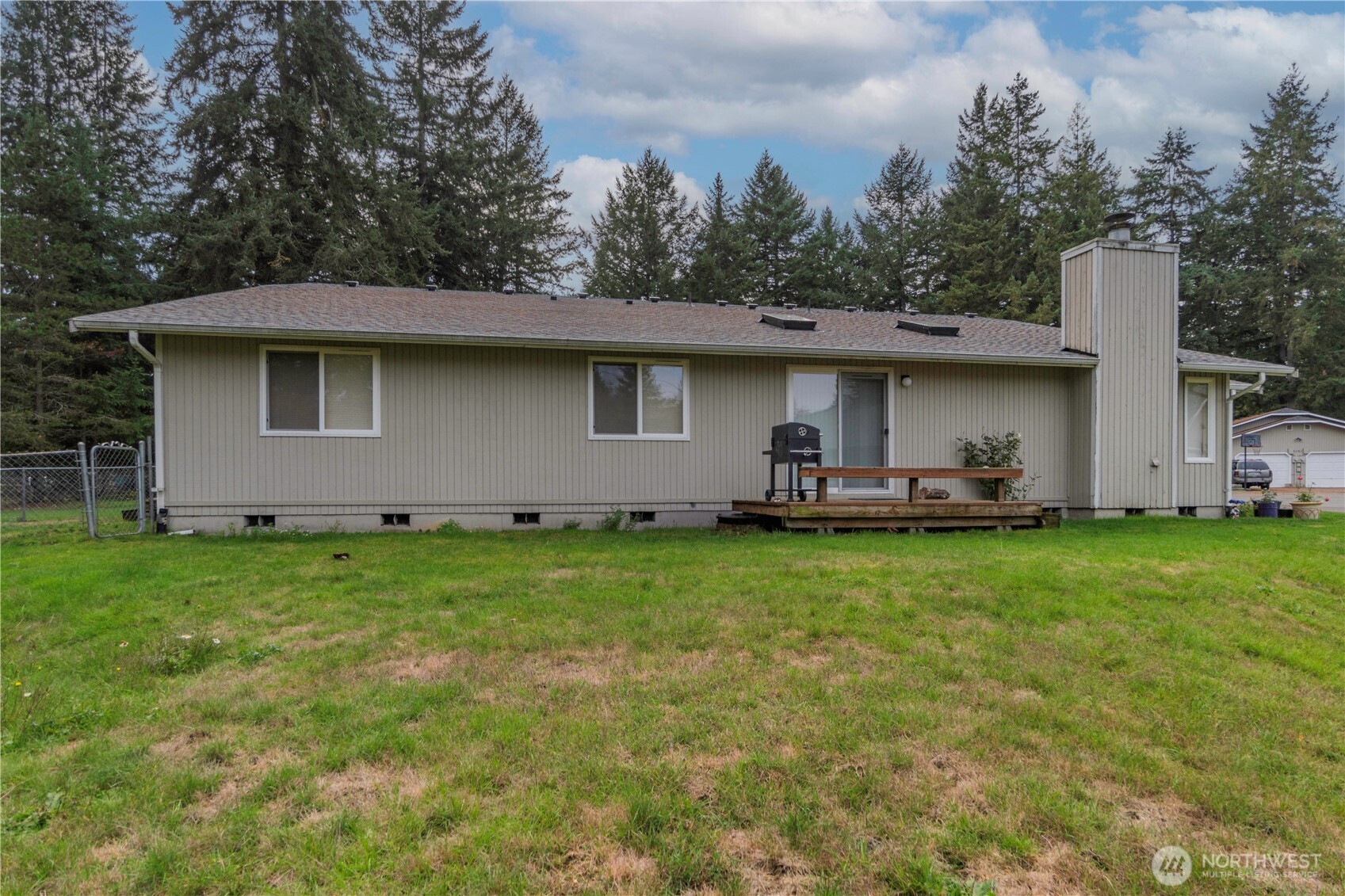 9041 Steilacoom Road Southeast Olympia, WA 98513 - Photo 11 of 12 a front view of house with yard and trees