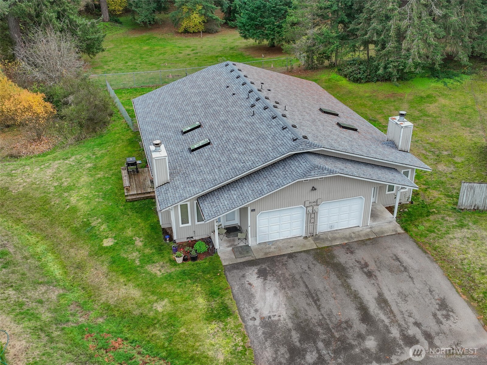 9041 Steilacoom Road Southeast Olympia, WA 98513 - Photo 2 of 12 front view of house with a yard