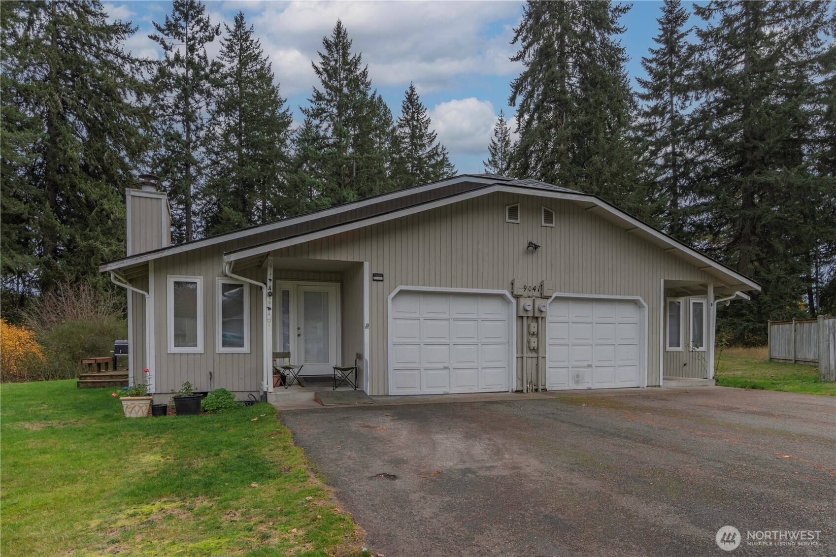 9041 Steilacoom Road Southeast Olympia, WA 98513 - Photo 6 of 12 a front view of house with yard and green space
