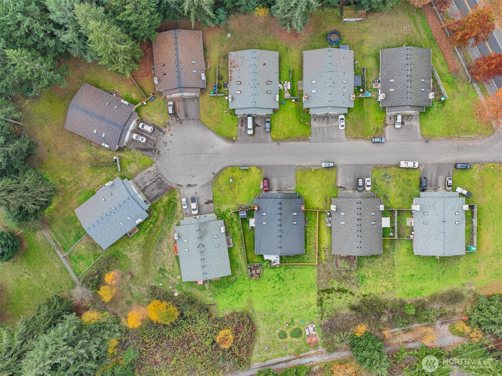 9041 Steilacoom Road Southeast Olympia, WA 98513 - Photo 7 of 12 an aerial view of residential houses with outdoor space and parking