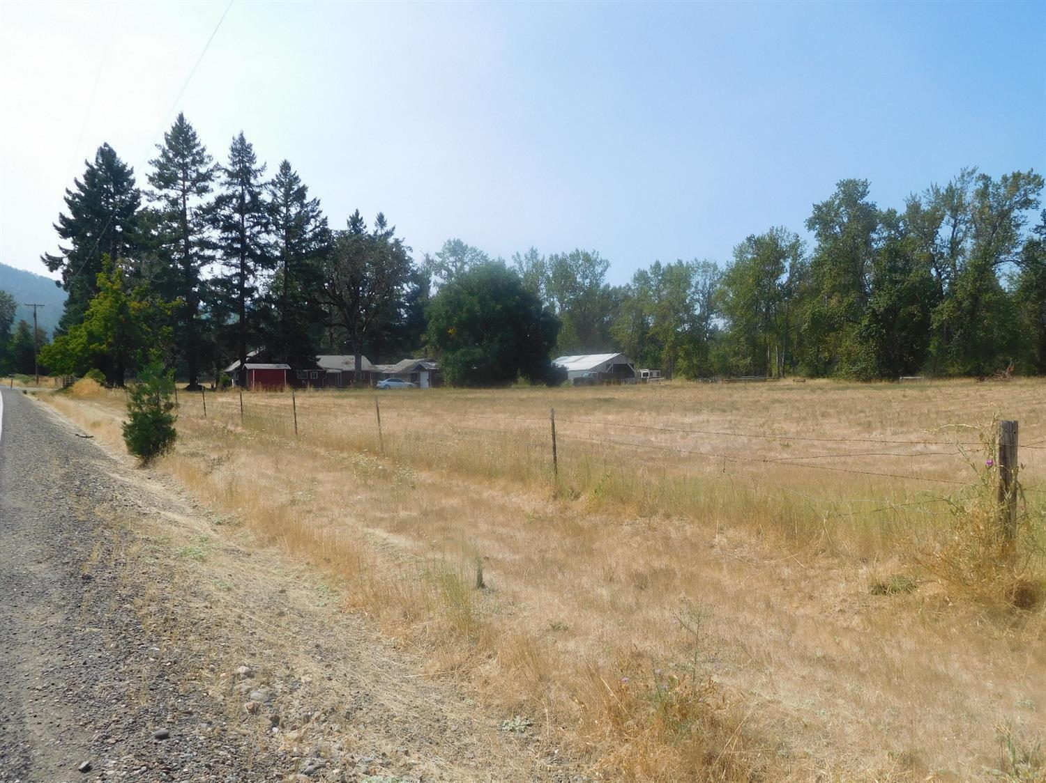 2180 Dick George Road Cave Junction, OR 97523 - Photo 6 of 34 View of home, from paved country road, t