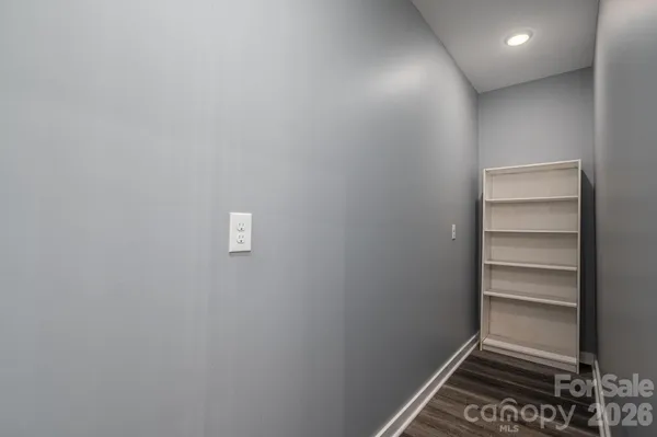 a kitchen with a stove a sink and a refrigerator