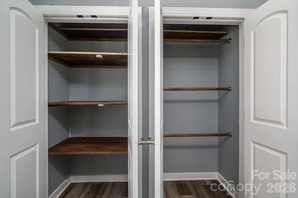 a view of room with window and ceiling fan