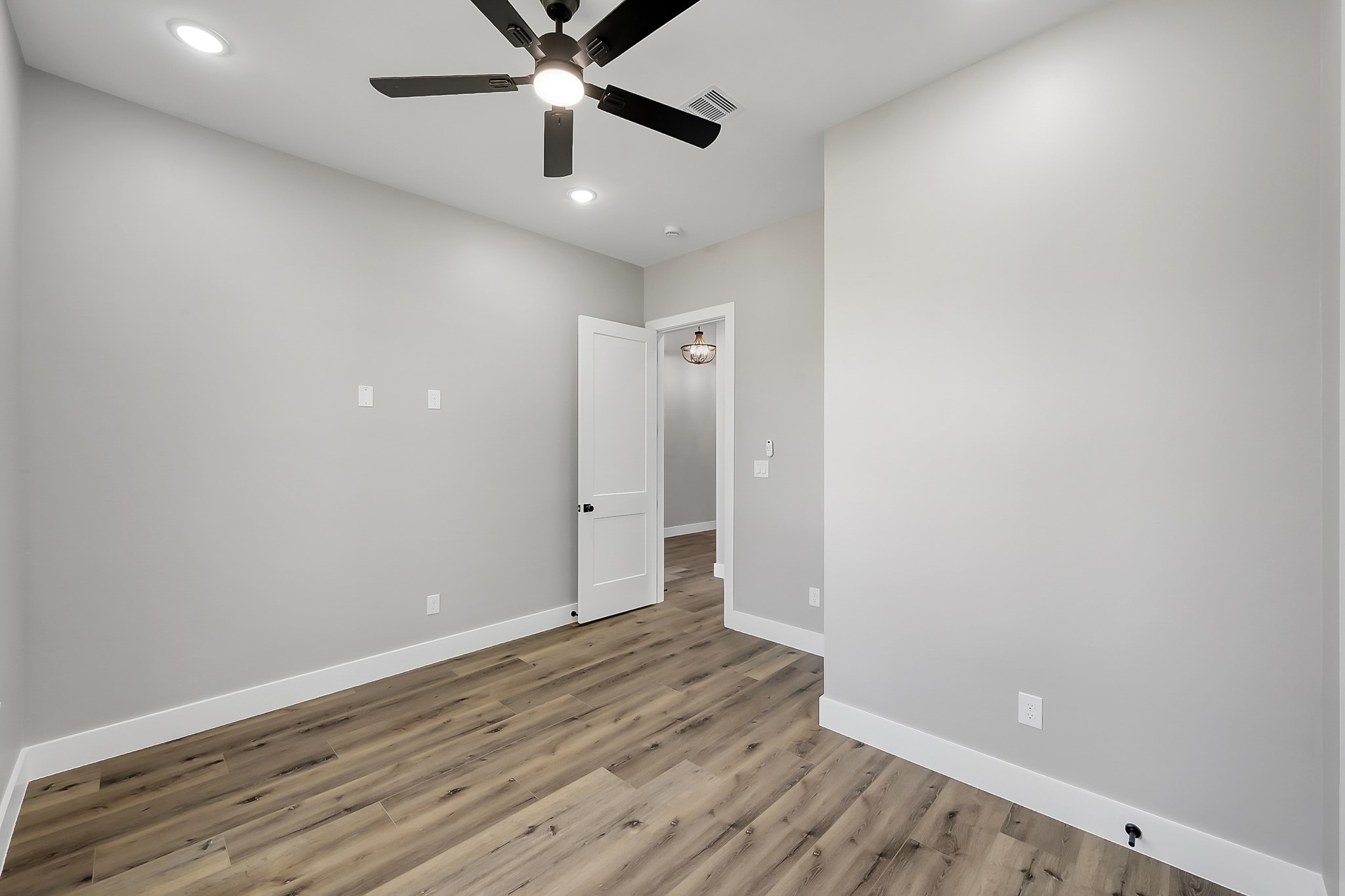 135 Wick Willow Road Montgomery, TX 77356 - Photo 34 of 50 wooden floor in an empty room
