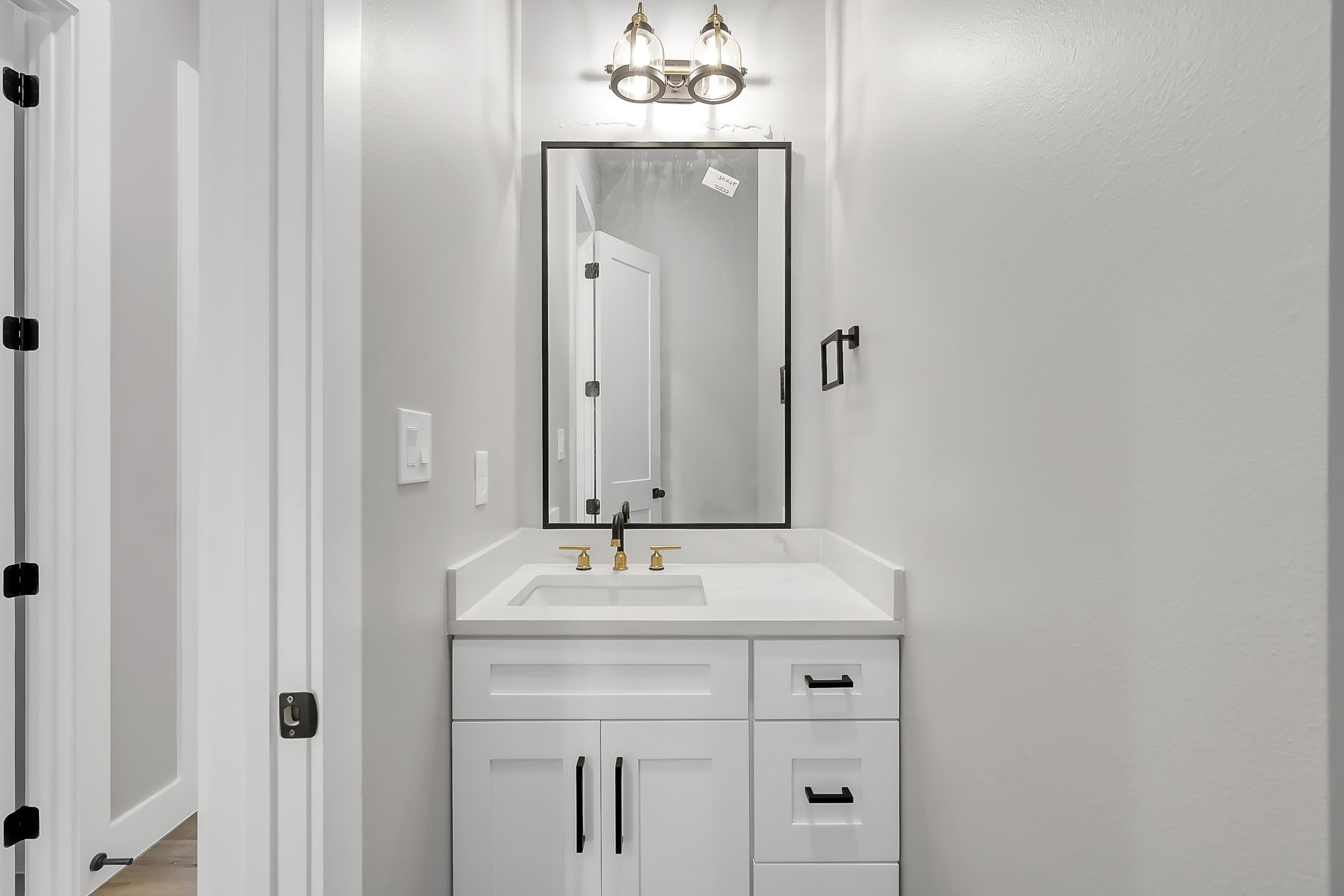 135 Wick Willow Road Montgomery, TX 77356 - Photo 36 of 50 a sink with a mirror