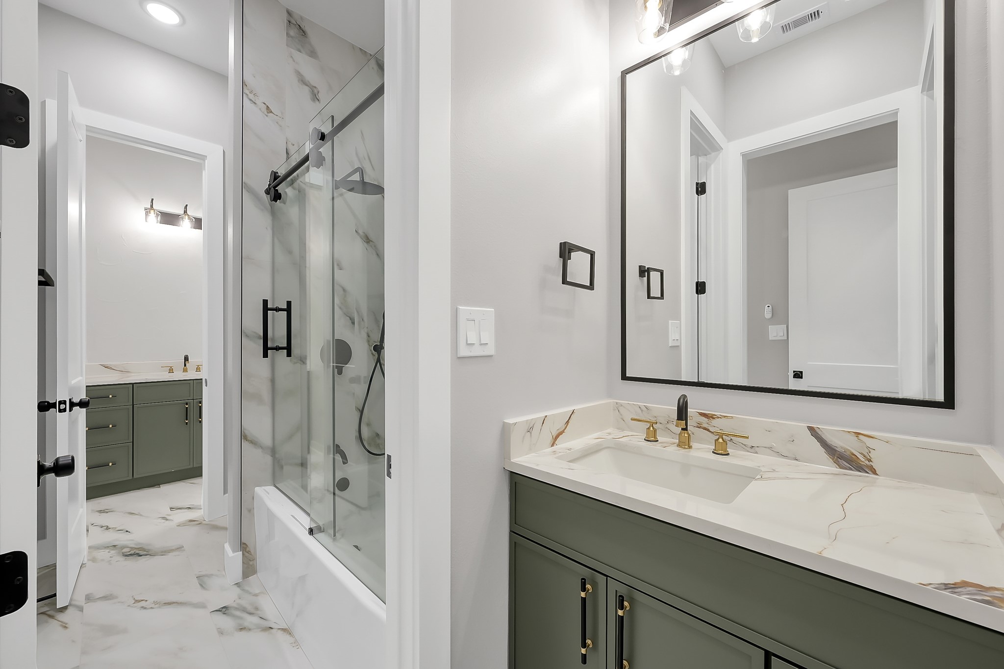 135 Wick Willow Road Montgomery, TX 77356 - Photo 40 of 50 a bathroom with a sink double vanity and shower