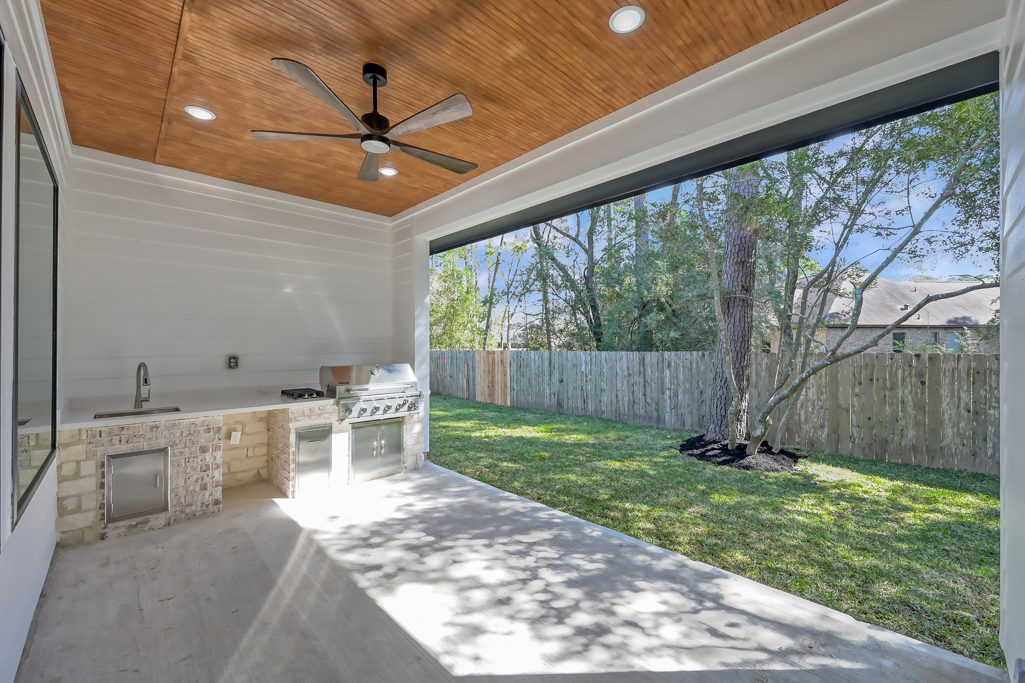 135 Wick Willow Road Montgomery, TX 77356 - Photo 45 of 50 a view of a backyard with garden