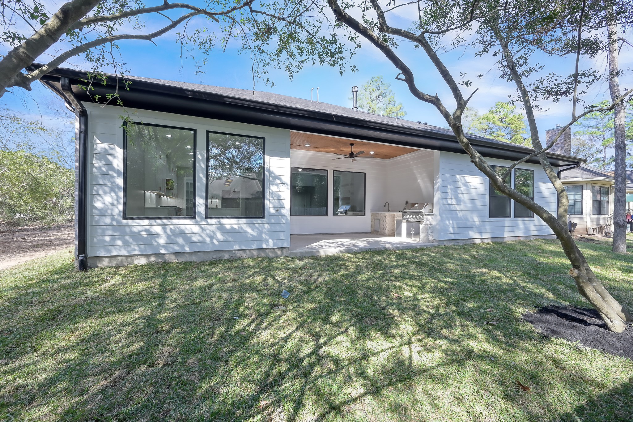 135 Wick Willow Road Montgomery, TX 77356 - Photo 49 of 50 a front view of a house with garden