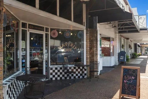 a view of a swimming pool with a lounge chairs