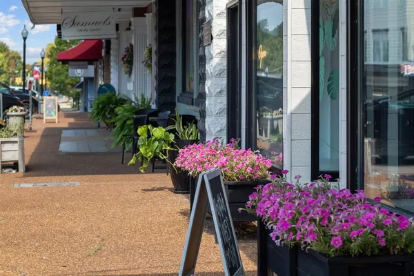 a view of a park with welcome board