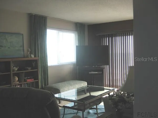 a workspace with furniture and window