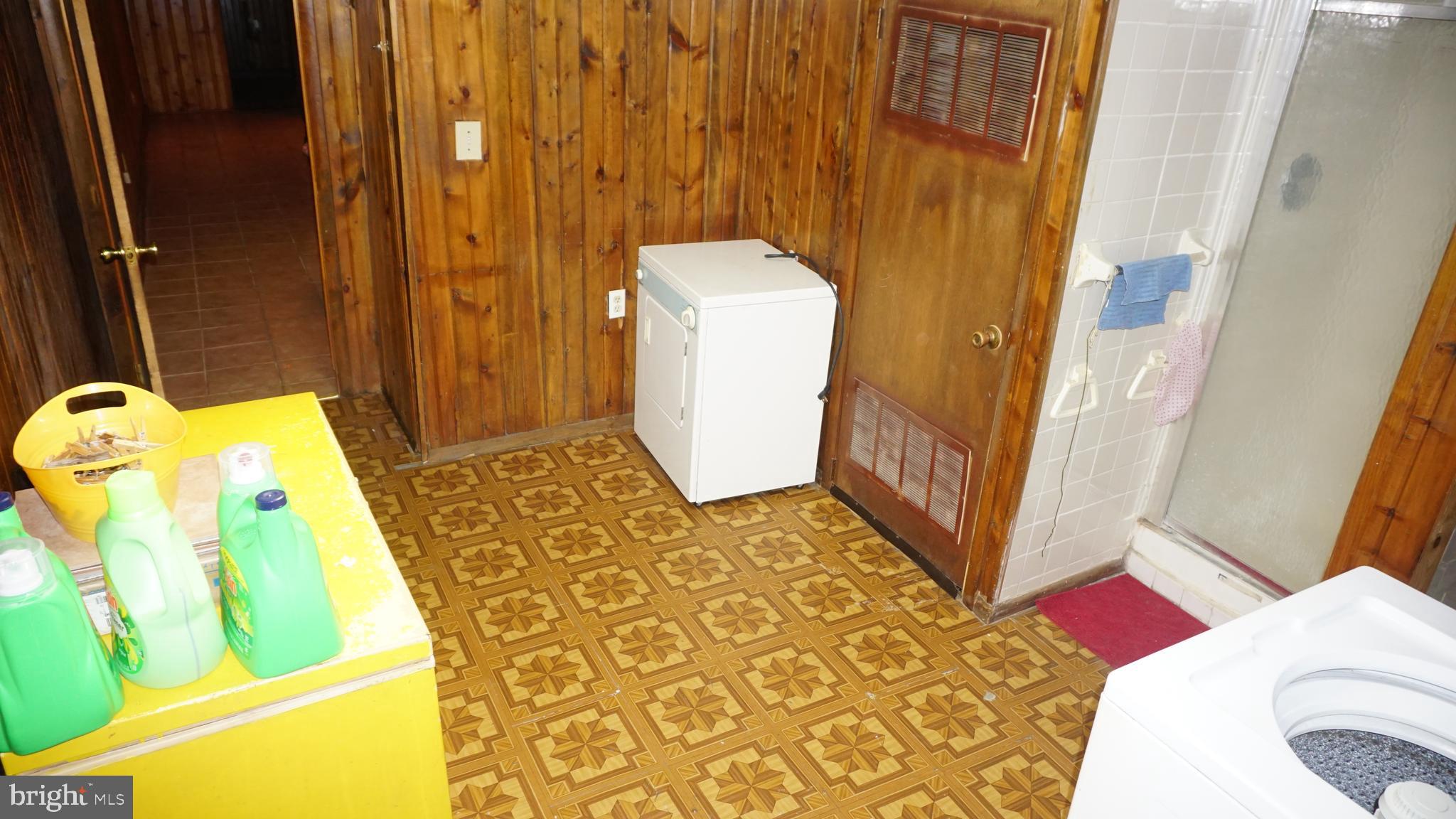 3005 Belair Road Baltimore, MD 21213 - Photo 11 of 33 a bathroom with a sink and mirror