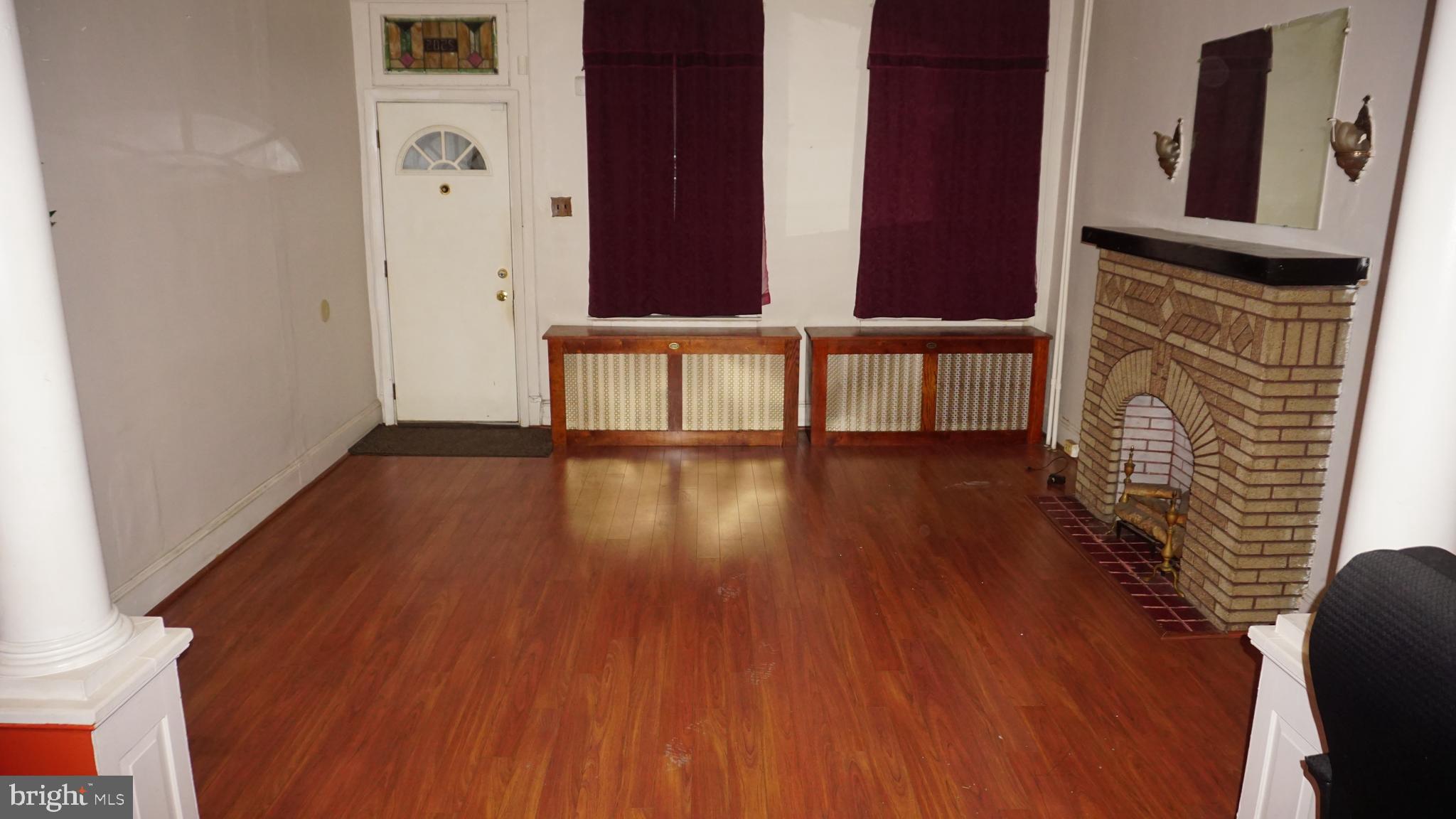 3005 Belair Road Baltimore, MD 21213 - Photo 4 of 33 a view of an entryway with wooden floor