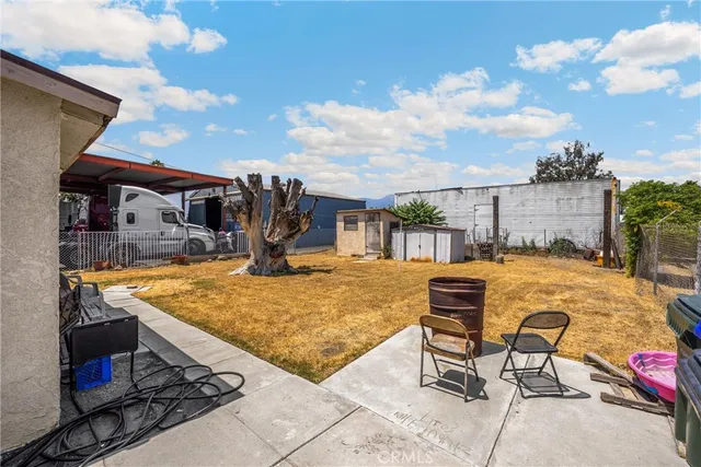 a view of a water with building in the background