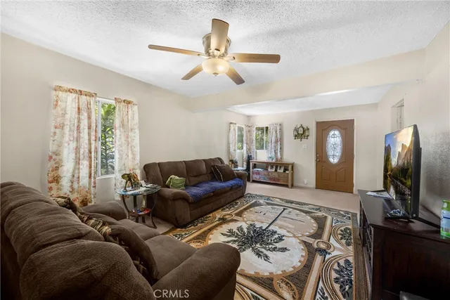 a kitchen with a dining table and chairs