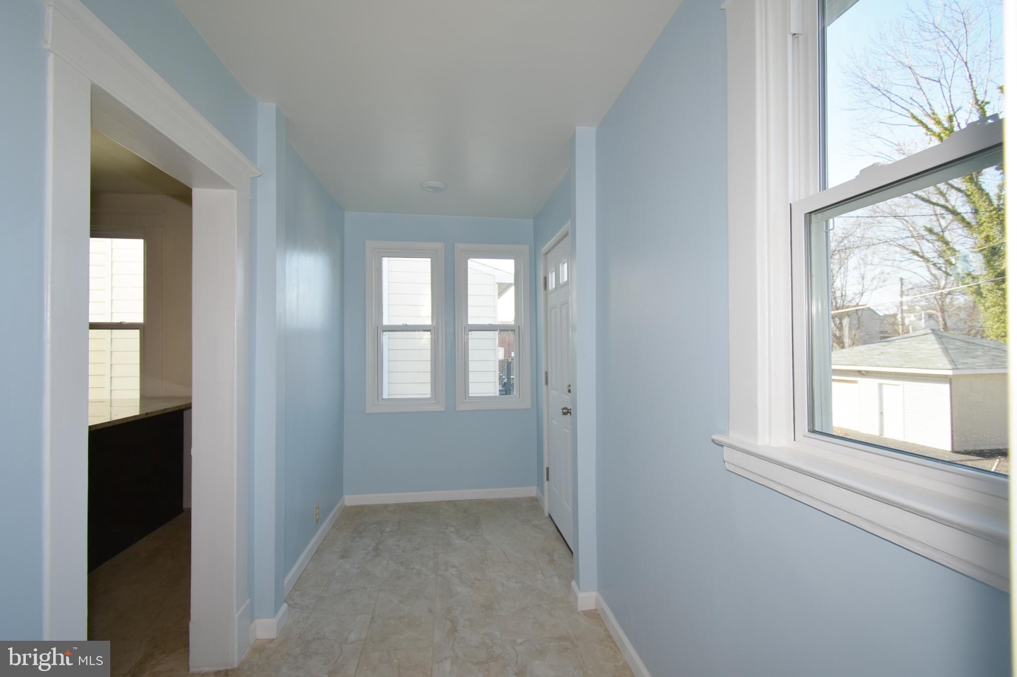 1418 Sulphur Spring Road Baltimore, MD 21227 - Photo 11 of 24 Den in rear