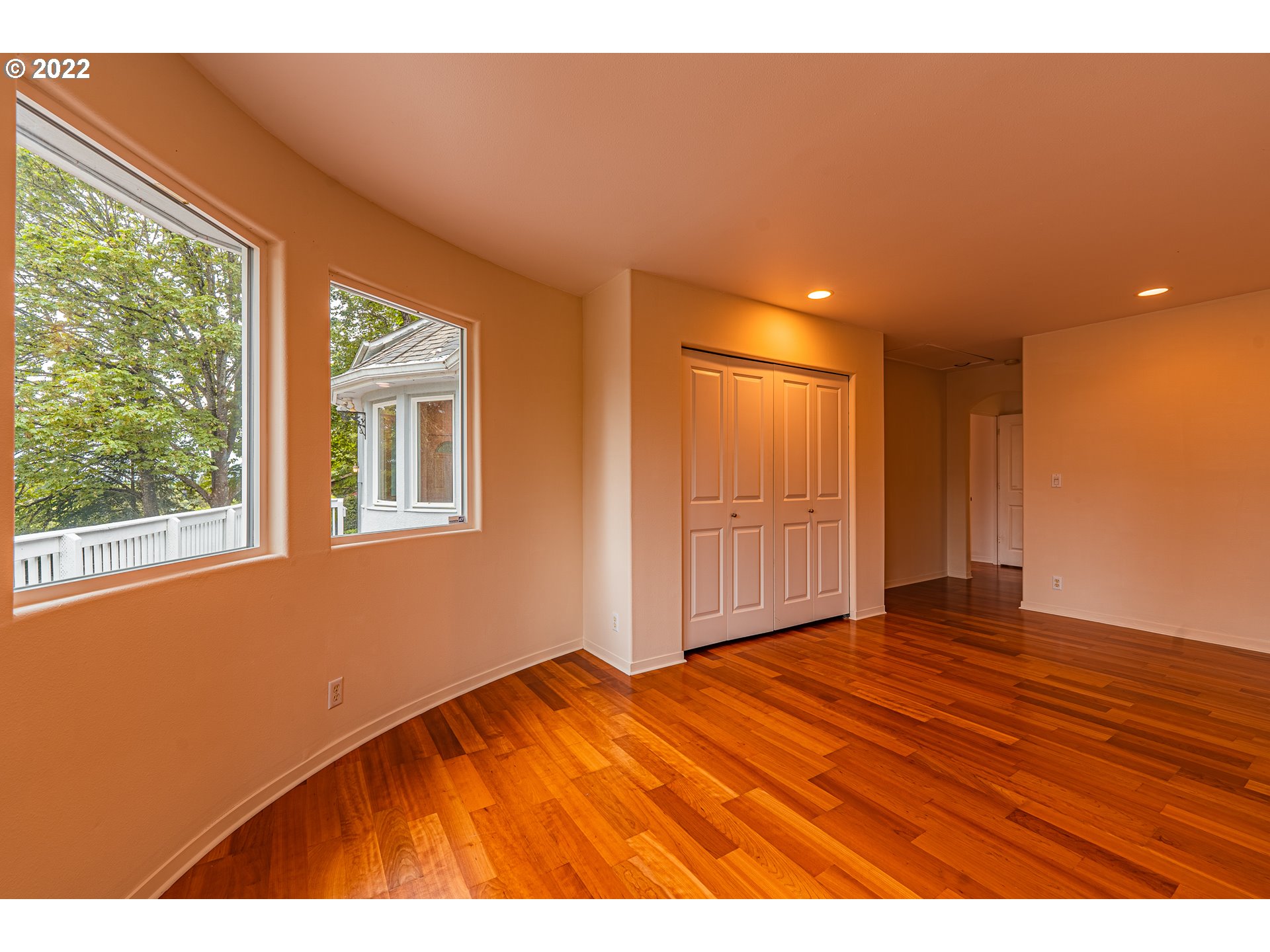 975 Sunset Drive Springfield, OR 97477 - Photo 17 of 30 a view of an empty room with wooden floor and a window